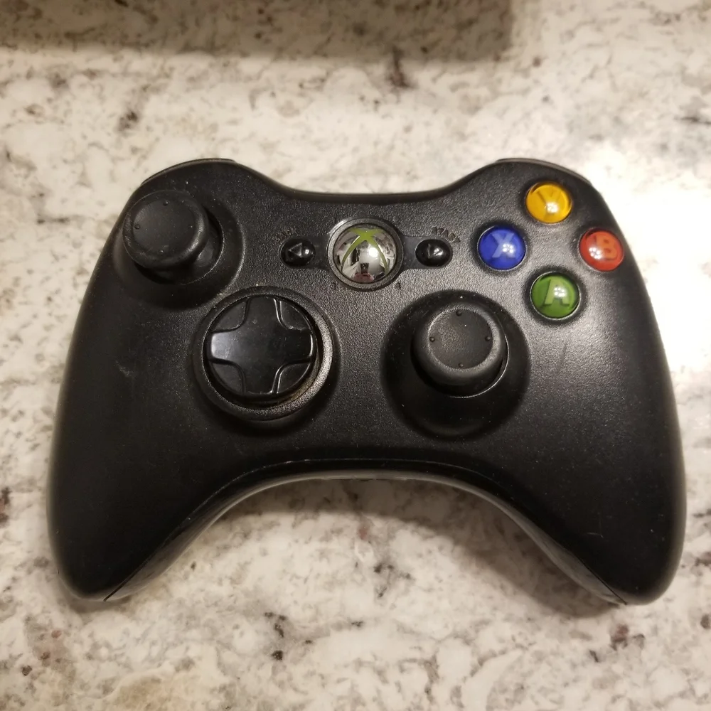 2 Controllers Wireless Xbox 360 & a wired Original X Box with Colored Buttons.